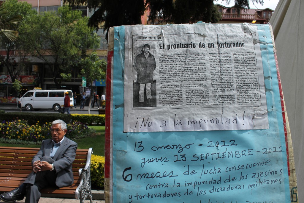 Newspaper headline: “The record of a torturer;” Written note: “No to impunity!  March 13, 2012 – Thursday, September 13, 2012: Six months of consecutive fight against impunity of murderers and tortures of the military dictatorships”